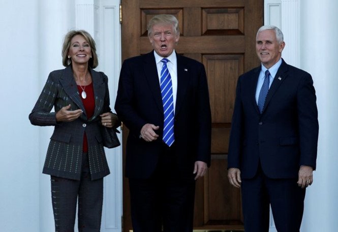 donald-trump-and-vice-president-elect-mike-pence-with-betsy-devos-at-trump-national-golf-club-in-bedminster-new-jersey_zumd